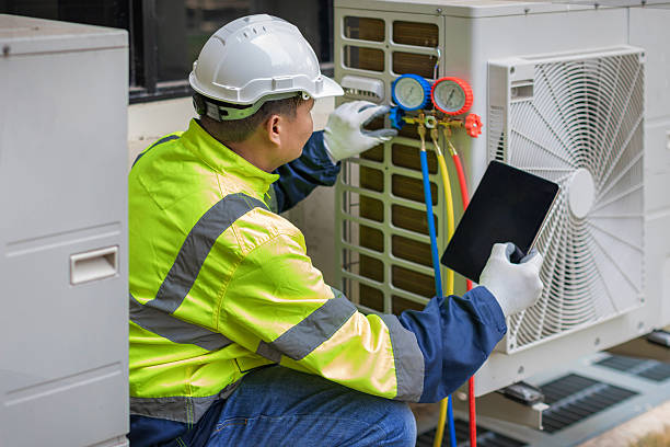 Professional Air Conditioning Repair technician working in Pisgah Forest, NC